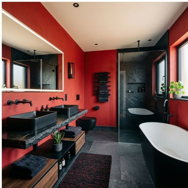 Modern Red Bathroom With Black Stone Accents